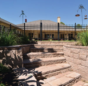 The stairs and retaining walls of a custom patio.