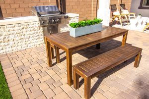 An inviting paver patio with BBQ island.