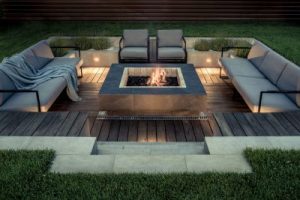 Square sunken fire pit surrounded by seating