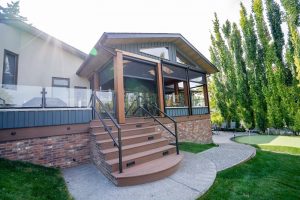 A patio with automated screens